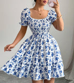 Women's floral summer dress with puff sleeves and smocked bodice 1