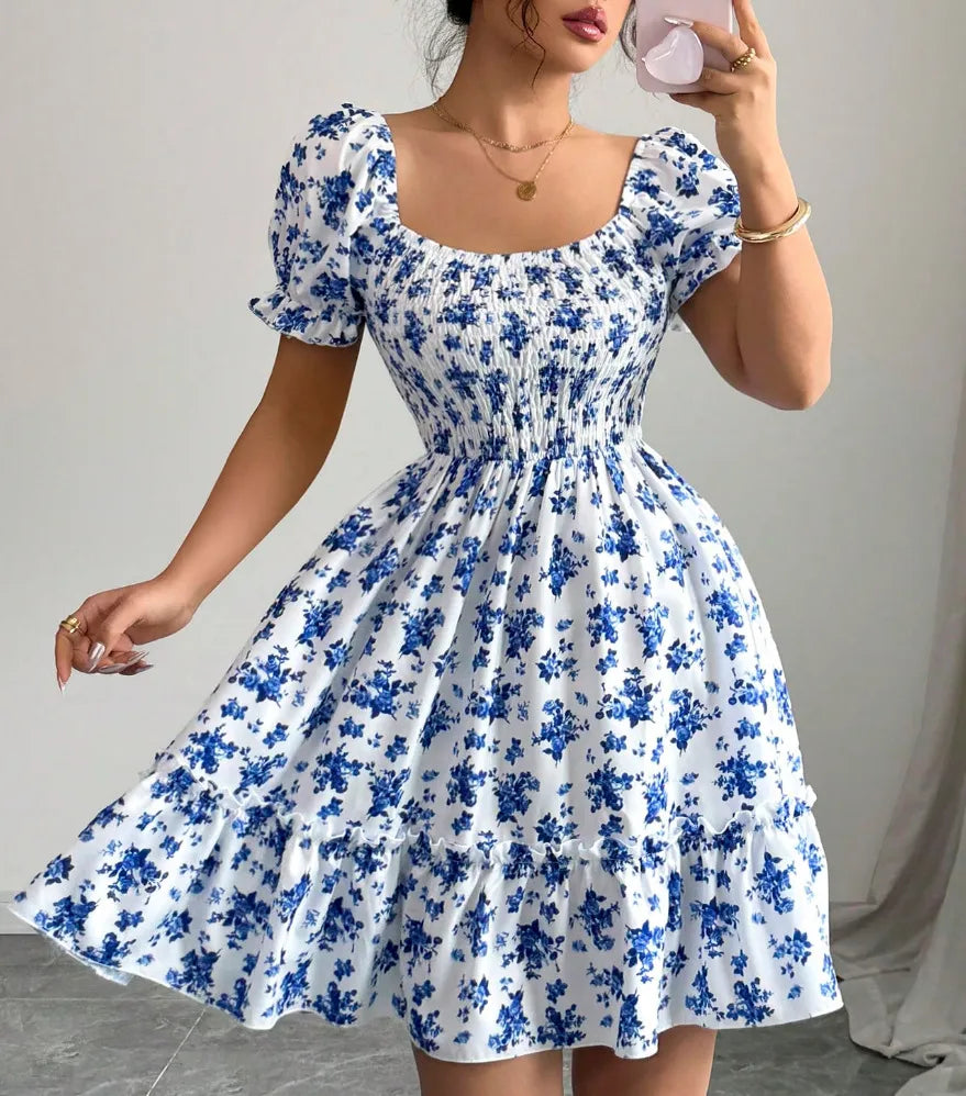 Women's floral summer dress with puff sleeves and smocked bodice 1