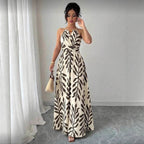 Women's maxi summer dress with halter neck and leaf print 1